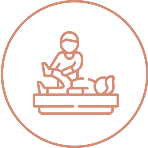 Massage therapy icon with therapist and client.