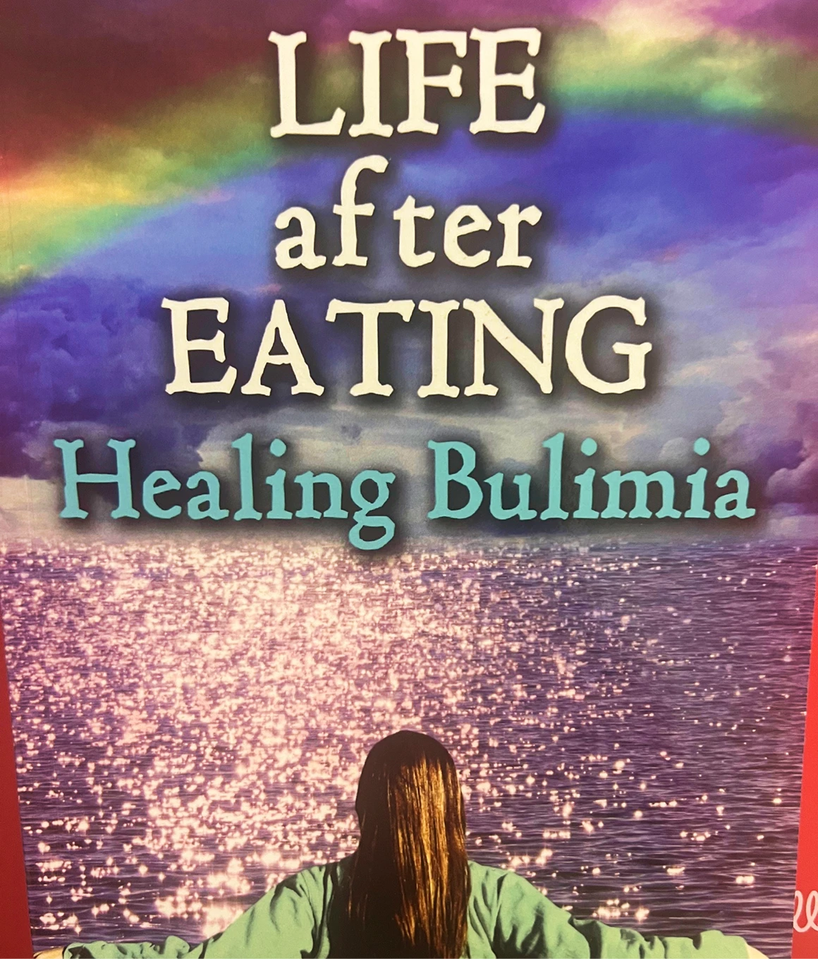 Healing bulimia book cover with rainbow.